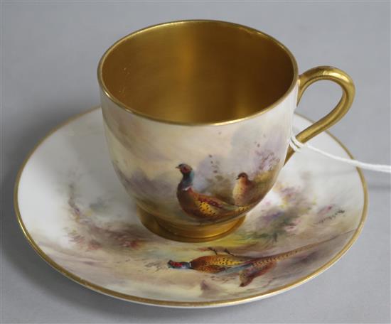 A Royal Worcester cabinet cup and saucer, signed Stinton
